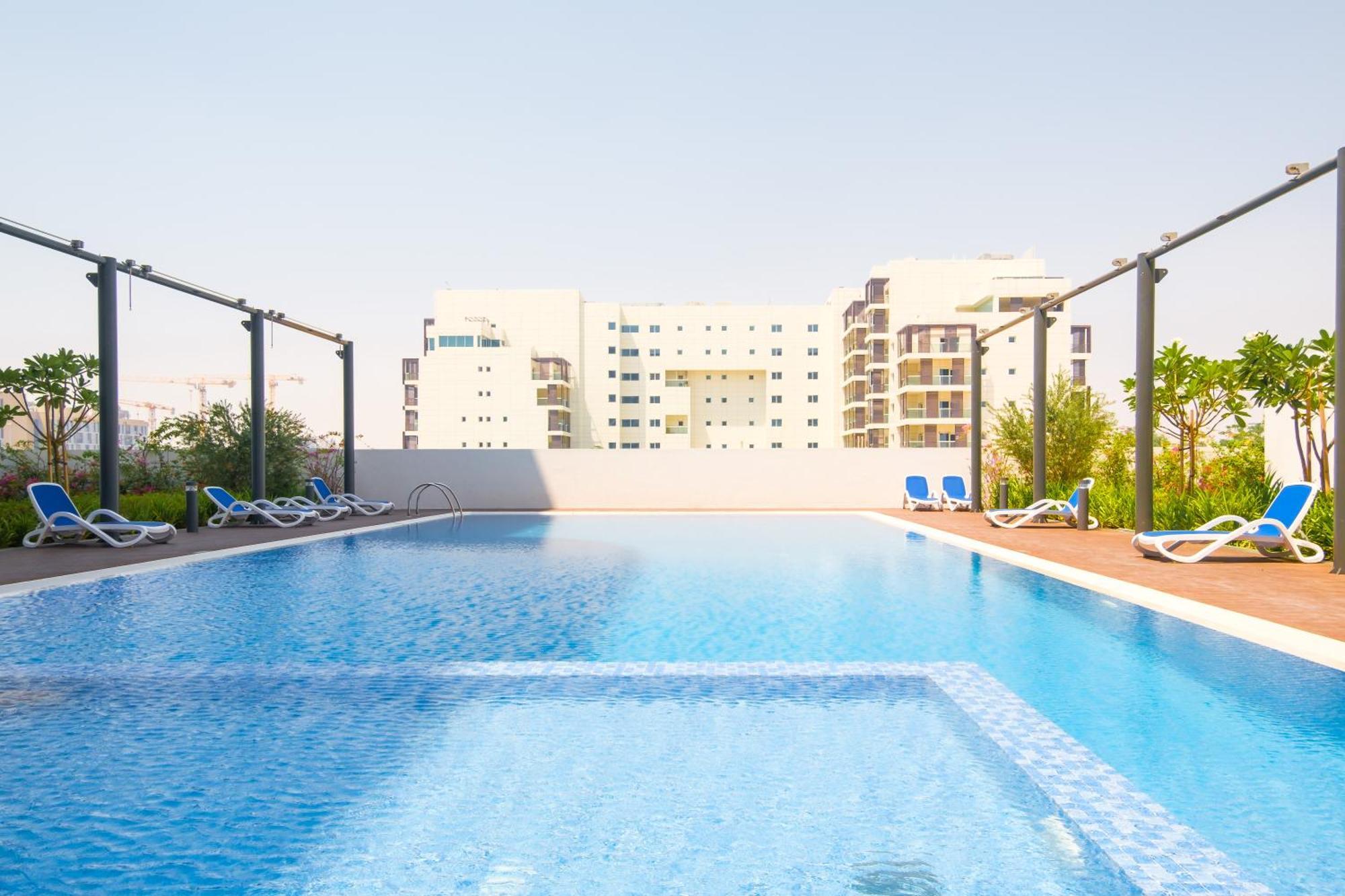 Apartament Poolside Charm Abu Zabi Zewnętrze zdjęcie